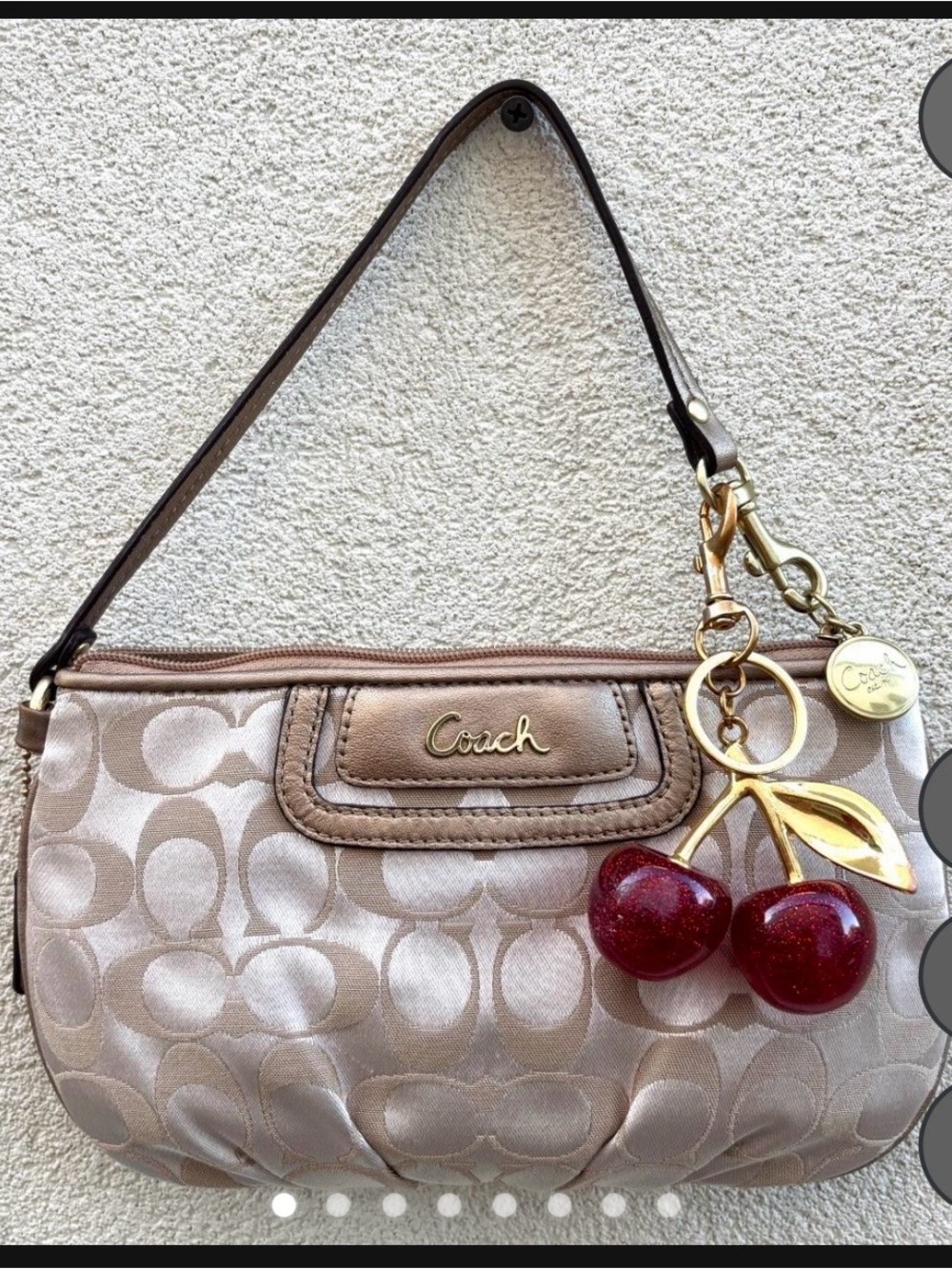 Coach gold wristlet